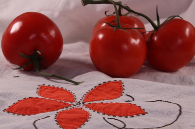 tomatoes and dish towel